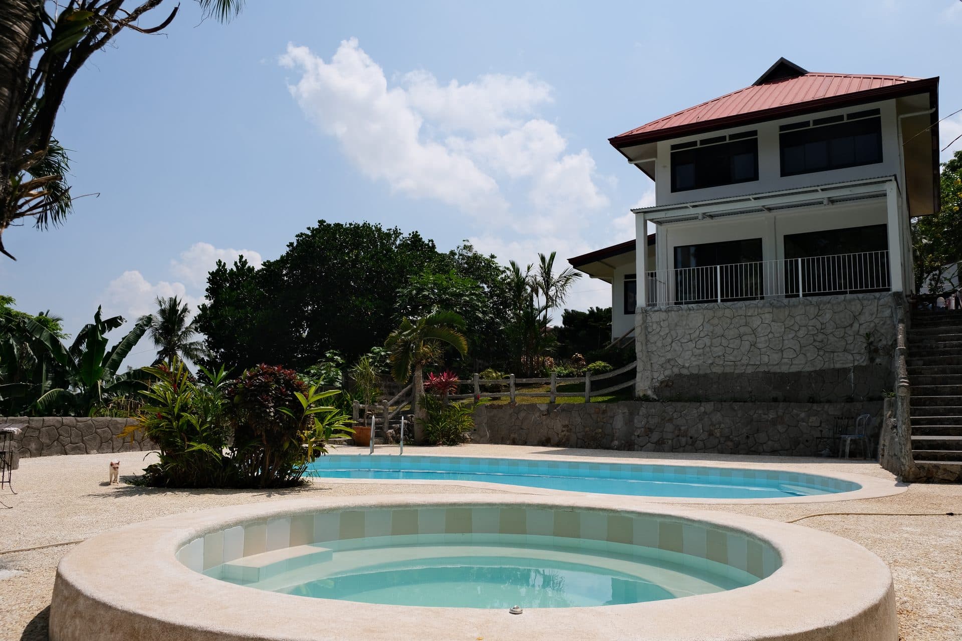 Balay Pansol pool and jacuzzi with house facade